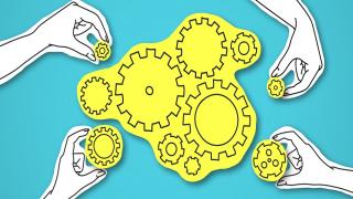 Collaboration concept - cogs and gears - engineering and marketing