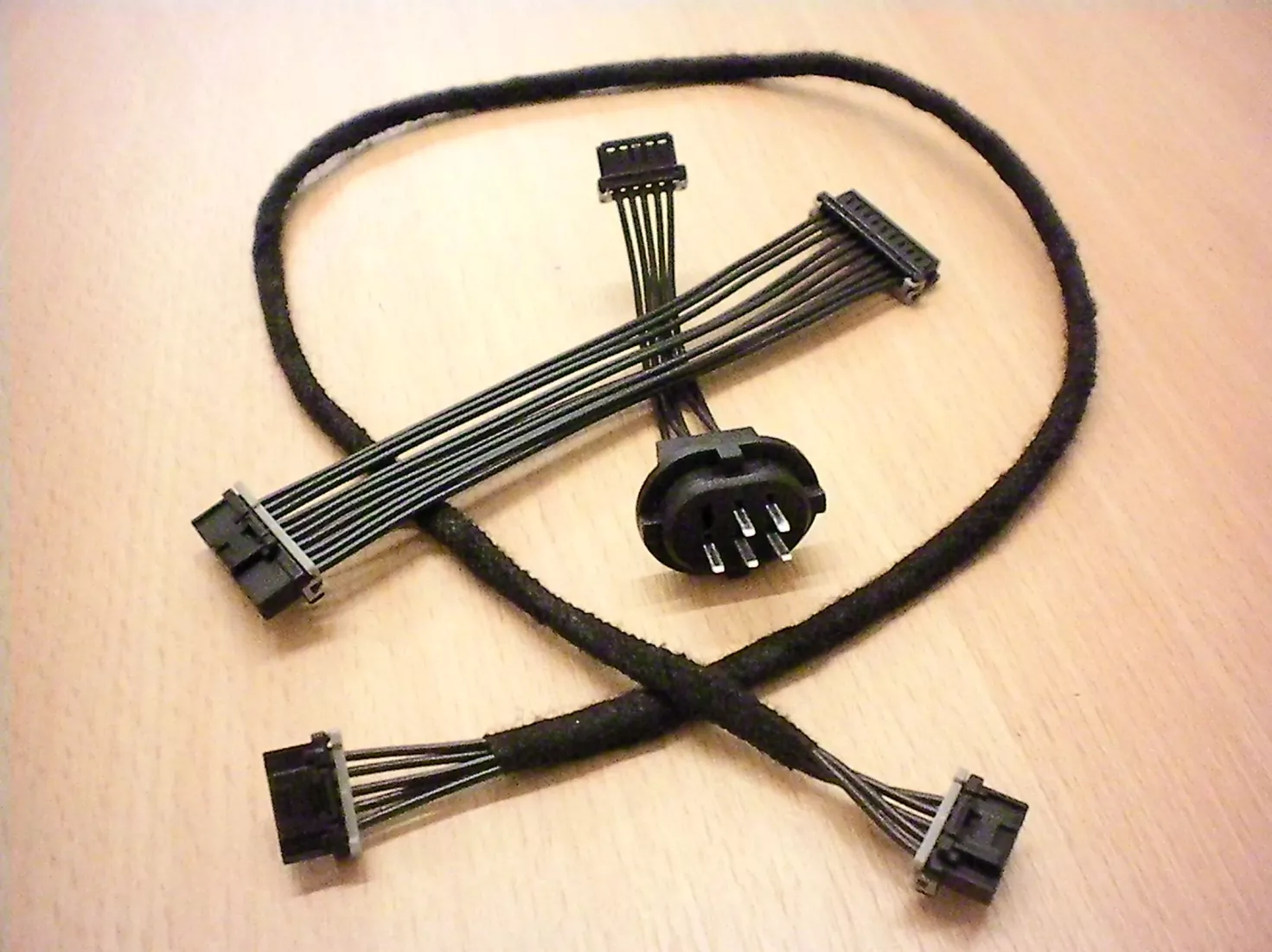 Media Name: converts_rear_light_cable_harness_for_new_electric_german_sports_car.jpg