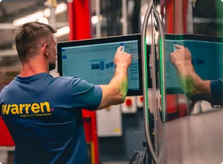 This is an image of Warren Services in their factory - a long-term members of Qimtek