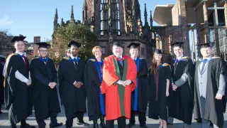 Media Name: ame_graduates_and_staff_l.jpg