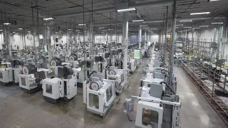 Media Name: cnc_millling_showing_factory_scale.jpg
