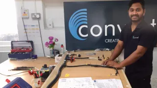 Media Name: converts_pandi_karuppiah_chinnadurai_working_on_the_cable_assemblies_for_mit.jpg