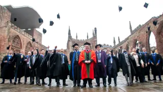 Media Name: graduation_ame_l_action.jpg