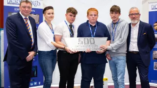 Media Name: metalcrafts_austen_adams_divisional_md_far_left_and_neil_kirby_apprentice_trainer_far_right_with_some_of_the_new_apprentices_joining_the_company.jpg