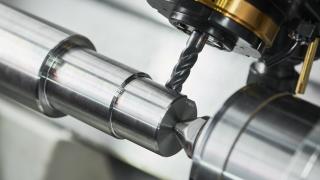 subtractive manufacturing concept - machining centre, turned parts, drilling.