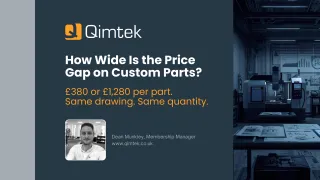 Dark industrial-themed banner showing a CNC machining workshop with technical drawings in the foreground. Overlaid text asks ‘How wide is the price gap on custom parts?’ with an example comparing £380 and £1,280 per part. Qimtek logo and author information for Dean Munkley are shown